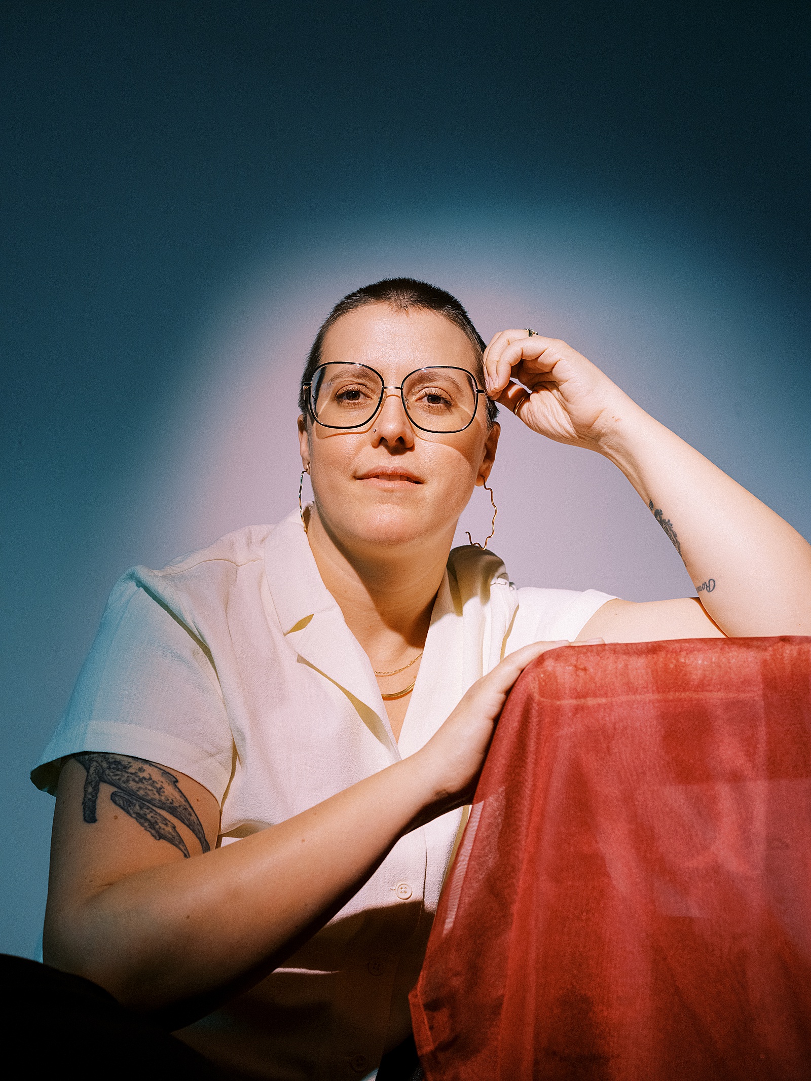 An ethical copywriter sits in a studio explaining human-centered marketing.